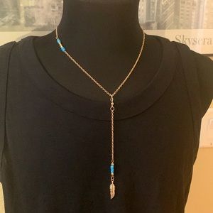 Gold tone Lariat necklace turquoise beads and a feather pendant adjustable New
